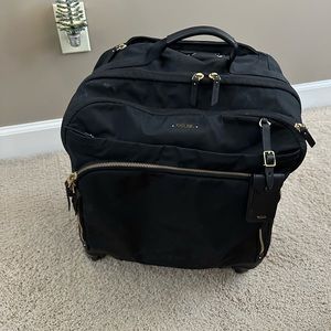 Gently used Tumi roller bag.